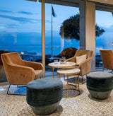 Fauteuil Croix — barcelona prussian, polished brass feet