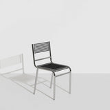 Chaise Sandows N°212 de René Herbst pour Petite Friture - structure acier chromé et sandows caoutchouc