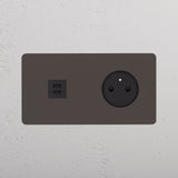 Vue d'ambiance de la prise USB-C et prise Kew bronze installée sur un mur
