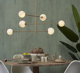 Suspension Carrara 3 bras 6 globes marbre blanc laiton It's About Romi - vue principale