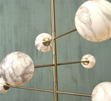 Suspension Carrara - vue de profil structure laiton