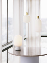 Suspension Amp Brass — White/Brass
